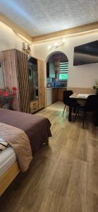 Posedenie v ubytovaní Apartamenty w Centrum - Zakopane