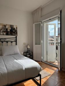 Posteľ alebo postele v izbe v ubytovaní Apartamento O Vento