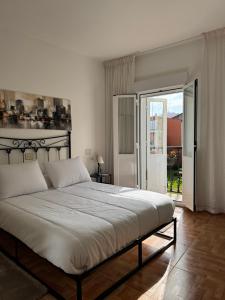 Posteľ alebo postele v izbe v ubytovaní Apartamento O Vento