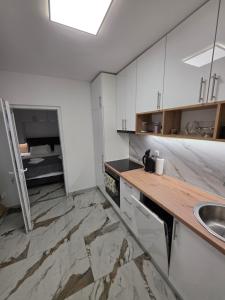 Fotografie z fotogalerie ubytování Apartmani Komatina Ðenovići 1 v destinaci Đenovići