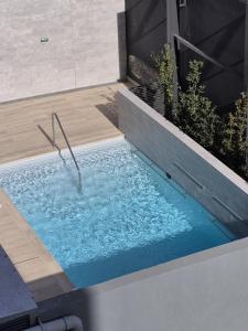 Πισίνα στο ή κοντά στο Acogedor departamento en Ñuñoa