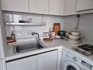 Kuchyň nebo kuchyňský kout v ubytování Dodu Beach House