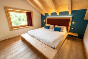 Postel nebo postele na pokoji v ubytování Bazzario Loft