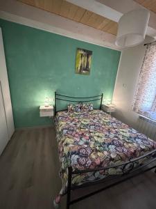 Postel nebo postele na pokoji v ubytování Il paradiso delle farfalle