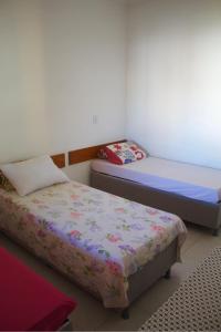 Postel nebo postele na pokoji v ubytování Recanto do Rey + 13 fotografií