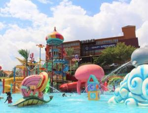 a water park with a water slide and a water park at 2 Bedroom Jonarrick Apartments Kisaasi in Kampala