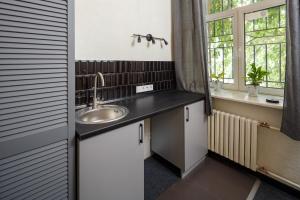 Kuchyň nebo kuchyňský kout v ubytování Mezzanine Hotel + 37 fotografií