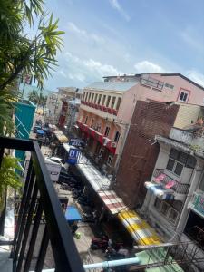 a view of a city street with buildings at Terpenica in Pattaya