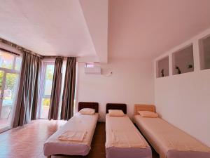 Letto o letti in una camera di Shkreli Apartments