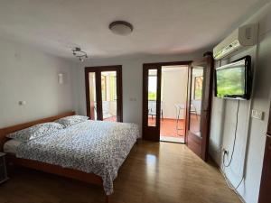 Posteľ alebo postele v izbe v ubytovaní Apartment Tea Katnic