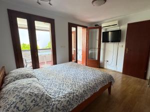 Posteľ alebo postele v izbe v ubytovaní Apartment Tea Katnic