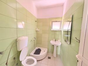 Bagno di Shkreli Apartments