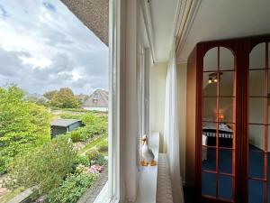 Zahrada ubytování Endreihenhaus in Keitum mit Badewanne und Grossem Garten