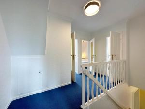 Postel nebo postele na pokoji v ubytování Endreihenhaus in Keitum mit Badewanne und Grossem Garten
