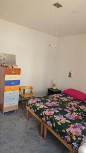 En eller flere senge i et værelse på Mancini house + 5 billeder