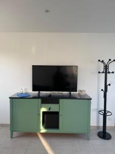 TV a/nebo společenská místnost v ubytování Gîte à Travers champs