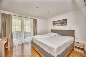 Voodi või voodid majutusasutuse Appartement Lechthaler toas