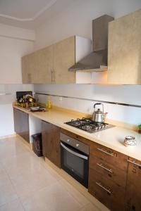 A kitchen or kitchenette at Eftalya Hostel Tanger