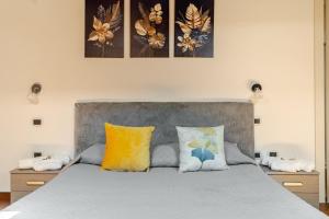 Ένα ή περισσότερα κρεβάτια σε δωμάτιο στο Ferrara Prestige - Stile & Comfort nel cuore Estense +20 φωτογραφίες