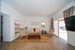 TV a/nebo společenská místnost v ubytování Luxury House La Maison