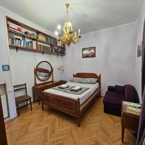 Postel nebo postele na pokoji v ubytování Tbilisi Guest House