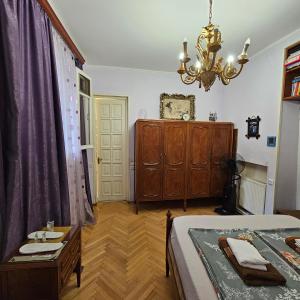 Postel nebo postele na pokoji v ubytování Tbilisi Guest House
