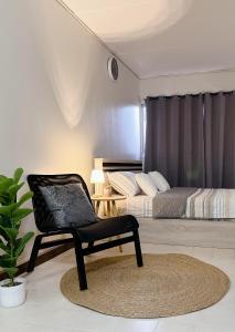 Posezení v ubytování Condo Popular T4 Impact Muangthong by Tide