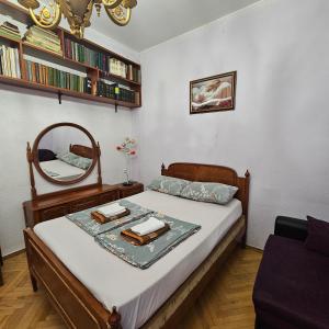 Postel nebo postele na pokoji v ubytování Tbilisi Guest House