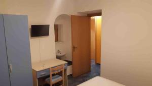 a room with a bathroom with a sink and a toilet at Apartment Vinisio a Maratea in Maratea