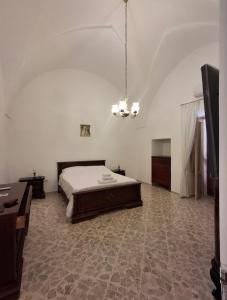 Ένα ή περισσότερα κρεβάτια σε δωμάτιο στο Capariella house