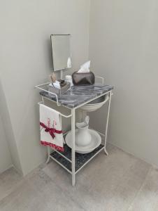 a dressing table with a mirror and a sink at Al Corso Charming Rooms in Peschici +53 photos
