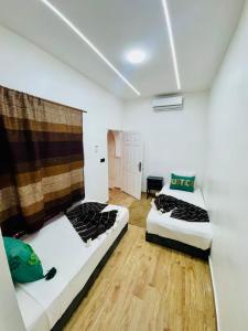 Postel nebo postele na pokoji v ubytování Maison N 07