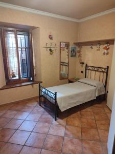 Katil atau katil-katil dalam bilik di casa Maurizio