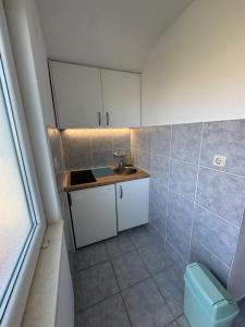 Kuchyň nebo kuchyňský kout v ubytování Apartment Marsela