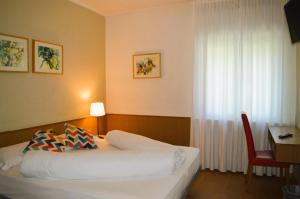 Postel nebo postele na pokoji v ubytování Park Hotel Sancelso