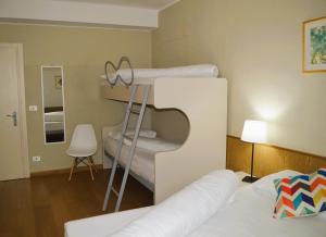 Postel nebo postele na pokoji v ubytování Park Hotel Sancelso