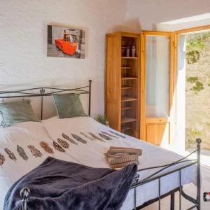 Postel nebo postele na pokoji v ubytování Rustico Lago di Como b&b