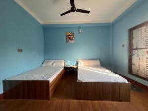 Postel nebo postele na pokoji v ubytování Hotel Atithi Devo Bhava