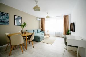 TV a/nebo společenská místnost v ubytování Retreat on Victoriei