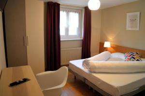 Postel nebo postele na pokoji v ubytování Park Hotel Sancelso