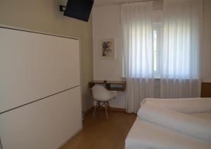Postel nebo postele na pokoji v ubytování Park Hotel Sancelso