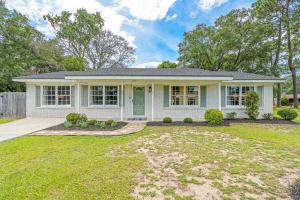 a small white house with a yard at Pool,FirePit,Gym,Game Rm,4BR3BA,Near Parris Island in Beaufort