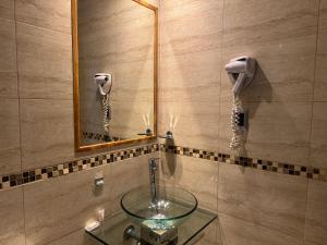 Ένα μπάνιο στο Infinity Park Hotel +40 φωτογραφίες