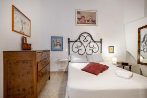 Postel nebo postele na pokoji v ubytování Corte Fiorita – Apulian Peaceful Retreat