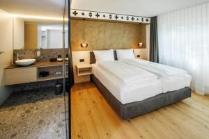 Postel nebo postele na pokoji v ubytování Hotel- Restaurant Krone