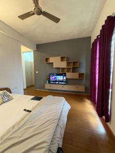 Postel nebo postele na pokoji v ubytování Penthouse with 2 Bedrooms near Wipro Corp office