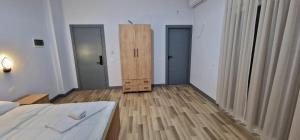 Postel nebo postele na pokoji v ubytování Hotel RADOJA