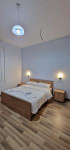 Postel nebo postele na pokoji v ubytování Hotel RADOJA