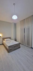 Postel nebo postele na pokoji v ubytování Hotel RADOJA