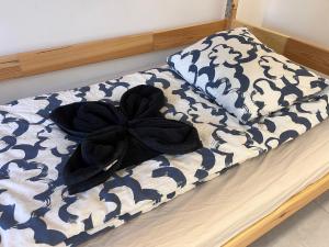 Postel nebo postele na pokoji v ubytování Golden Hostel